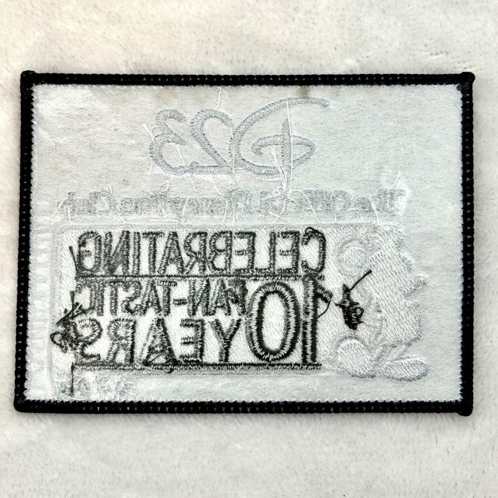 Disney D23 Official Fan Club Celebrating 10 Fan-Tastic Years Patch Black White - Picture 2 of 2